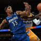 Dante Cunningham of the Minnesota Timberwolves and J.J. Hickson of the Denver Nuggets
Doug Pensinger/Getty Images